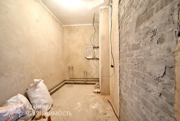 Фото Просторная двухкомнатная квартира в новом доме недалеко от метро. — 27